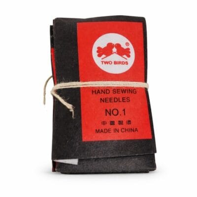 Two Birds hand sewing needles No.1 pack with black and red packaging on white background