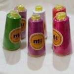 Colorful MH polyester sewing thread cones for industrial sewing, tailoring, embroidery, and fashion design